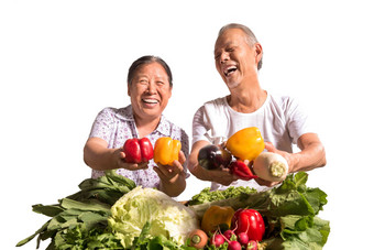 农民夫妇出示自家蔬菜