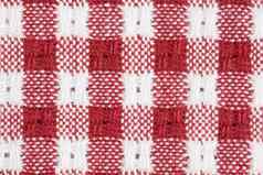 红色的白色条格平布网纹桌布背景