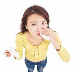 亚洲年轻的女人流鼻涕的鼻子组织