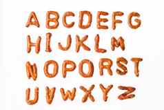字母椒盐卷饼字符信字体。零食