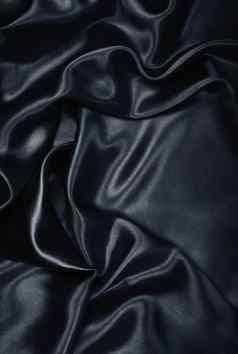 光滑的优雅的黑色的丝绸缎背景