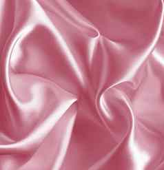 光滑的优雅的粉红色的丝绸缎婚礼背景