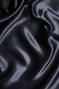 光滑的优雅的黑暗灰色丝绸缎背景