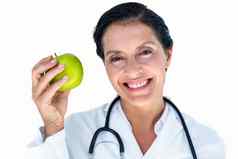 自信女医生持有绿色苹果