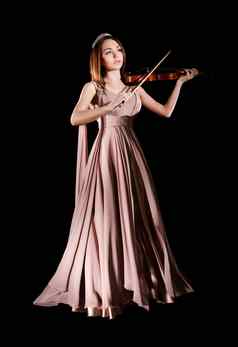 漂亮的年轻的女人玩小提琴