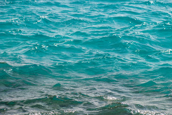 照片<strong>特写</strong>镜头美丽的清晰的绿<strong>松石</strong>海海洋水表面涟漪低波海景背景水平图片
