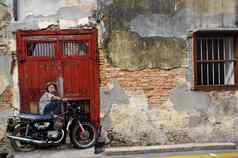 槟城马来西亚4月一般视图壁画的男孩自行车的画欧内斯特zacharevic壁画壁画绘画早期
