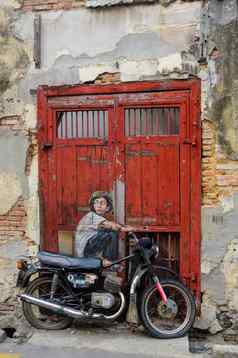 槟城马来西亚4月一般视图壁画的男孩自行车的画欧内斯特zacharevic壁画绘画早期