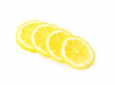 特写镜头新鲜的柠檬水果片白色背景夹针