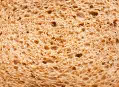 关闭纹理棕色（的）黑麦面包宏细节食物