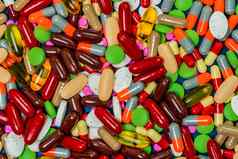 桩色彩斑斓的平板电脑胶囊药片完整的框架医学维生素补充前视图药片背景药物维生素补充Herbal医学交互概念