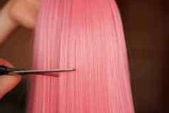 假发剪刀粉红色的假发发型背景