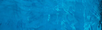 蓝色的<strong>水纹理</strong>摘要背景游泳池波设计