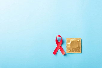 红色的弓丝带象征艾滋病毒艾滋病癌症意识<strong>避孕套</strong>