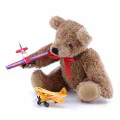小可爱的泰迪玩玩具飞机