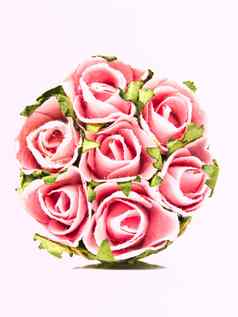 粉红色的纸玫瑰花束孤立的白色背景