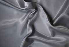 光滑的优雅的银色的灰色丝绸背景