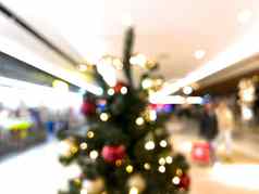 模糊装饰圣诞节树购物购物中心背景
