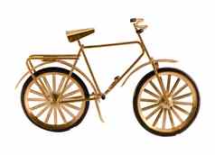小黄金颜色玩具自行车孤立的白色