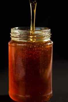 蜂蜜细流下降蜂蜜Jar