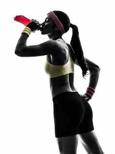 女人锻炼健身喝能源喝轮廓