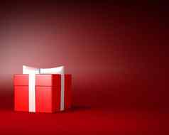 红色的礼物盒子白色丝带弓红色的背景