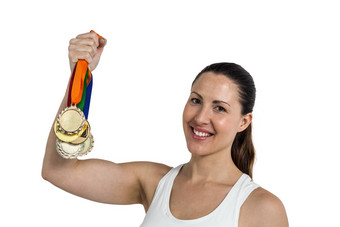女运动员摆姿势黄金奖牌胜利