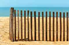 栅栏沙子海滩海洋私人海滩概念