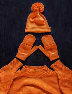 帽绒球连指手套毛衣黄橙色的颜色