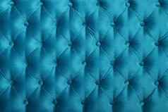蒂尔蓝色的capitone植绒的织物室内装潢纹理