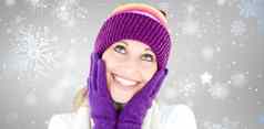 复合图像快乐的年轻的女人帽手套冬天