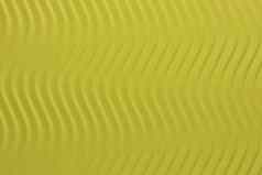 黄色的纸波纹理压花波详细的纸背景波纹波浪纸板背景