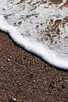 海波泡沫海滩沙子海洋夏天背景