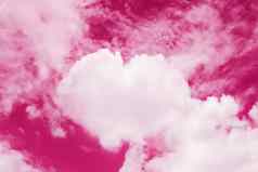 情人节心形状的云天空情人节背景粉红色的颜色主题甜蜜的形状的云心天空云爱感觉颜色粉红色的背景情人节