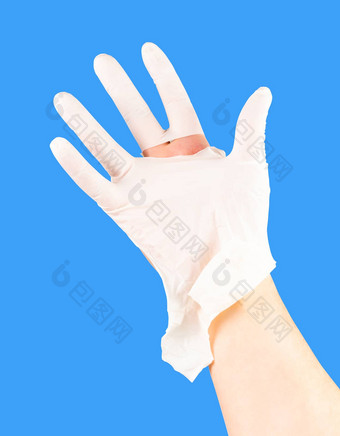 破碎的白色乳胶外科医生医疗手套高加索人手孤立的蓝色的纯色背景