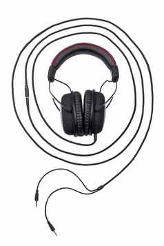 《连线》杂志黑色的游戏耳机包围同心圆线孤立的白色背景