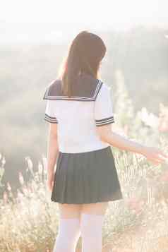 肖像亚洲日本学校女孩服装公园