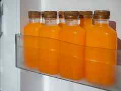 橙色汁冰冷瓶