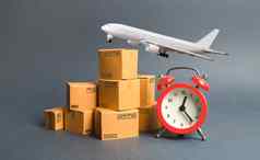 货物飞机堆栈纸板盒子红色的报警时钟表达空气交付概念临时存储有限的提供折扣优化物流改善效率