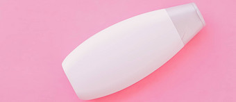 空白标签洗发水瓶淋浴过来这里粉红色的背景美产品身体护理化妆品