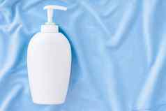 空白标签瓶抗菌液体肥皂手洗手液模型蓝色的丝绸卫生产品健康护理