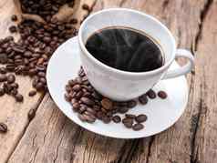 热咖啡杯咖啡豆木表格咖啡背景咖啡馆咖啡商店