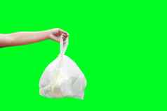 手携带浪费塑料垃圾袋孤立的绿色屏幕背景手持有塑料垃圾袋转储浪费绿色屏幕演讲