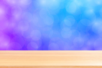 空木表格地板上模糊散景软紫色的梯度背景木<strong>板材</strong>空紫色的散景色彩斑斓的光阴影色彩斑斓的散景灯梯度软横幅广告产品