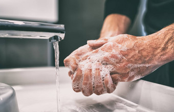冠状病毒流感大流行预防洗手肥皂温暖的水摩擦指甲手指洗经常手洗手液过来这里