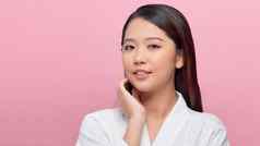 美丽的年轻的亚洲女人清洁新鲜的皮肤女孩美脸护理面部治疗美容美水疗中心