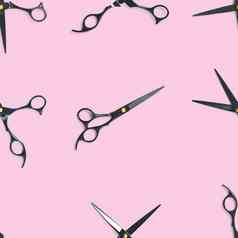 无缝的模式黑色的剪刀专业理发师黑色的剪刀孤立的粉红色的黑色的理发师剪刀关闭流行艺术背景