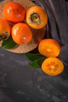 成熟的柿子水果软木塞板