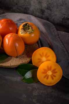成熟的柿子水果软木塞板