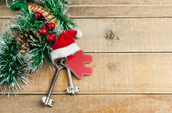 美丽的圣诞节背景装饰房子关键锁木精品板材概念金融住房贷款前视图真正的房地产概念